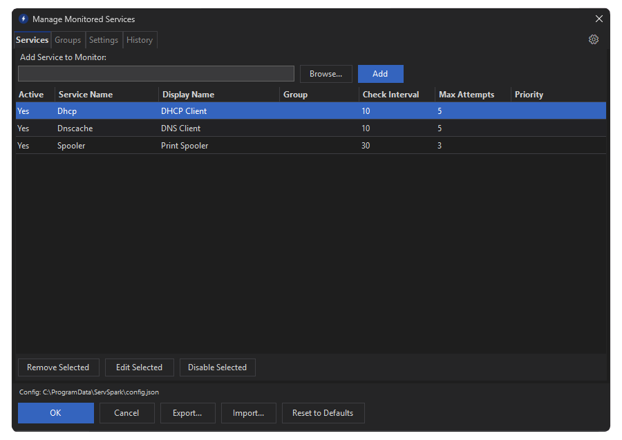 ServSpark dark mode interface showing monitored Windows services